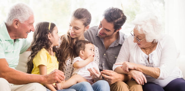 happy extended family smiling home 107420 10269